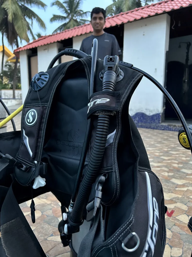 Close-up of a Scubapro BCD mounted on a tank outside the dive centre